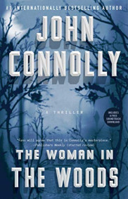 book cover of The Woman in the Woods